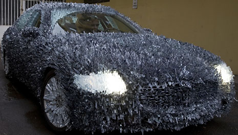 Maserati Quattroporte covered in shattered glass